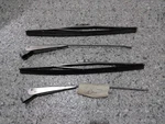 56-62 C1 Corvette Lh/rh Windshield Wiper Arms W/BLADES--GM#3724031/032/030--NOS. Fixed Price $349.95.
