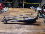 1995-1997 Ford Contour Front Windshield Wiper Motor W/ Transmission Linkage. Fixed Price $50.00.